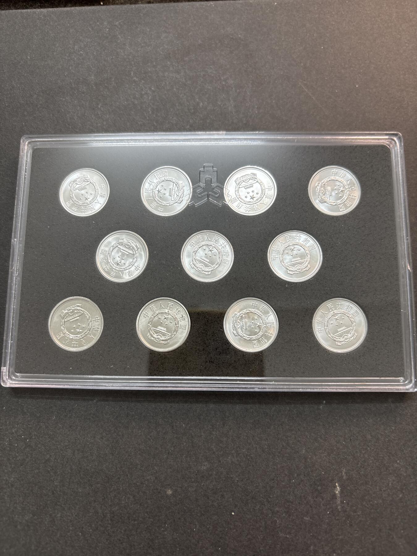 文馨钱币收藏第 278 场，银元，纸币，铜章场 长期接收代拍品 全新带册子未流通 2005-2017 年 1 分 10 枚一册