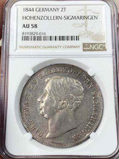 万国钱币拍卖第054期 - NGC AU58 1844年德国霍亨索伦-西格玛宁根大窗帘流通2泰勒 邦国顶级名誉品种 双狗护盾纹章 1844发行量仅3300枚 淡彩环绕 高点亦非常出彩