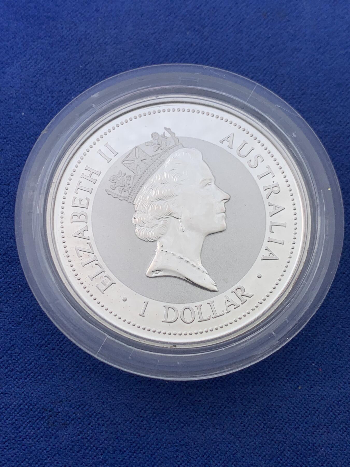 《竞宝斋》第434场 周日，周一2场连拍 （全场包邮） 澳大利亚 1997年 笑翠鸟 熊猫镶嵌银币 含纯银1盎司999银 镶嵌部分重约0.5克黄金，发行1.5万枚，为上海国际钱币展而发行