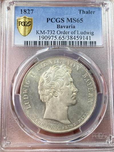 万国钱币拍卖第054期 - PCGS MS65 1827巴伐利亚路德维希勋章历史泰勒 1827年8月25日，路德维希一世以国王之名设立了路德维希勋章，用以表彰为王国服务满50周年的杰出人员，并敕令造币厂发行此历史泰勒加以纪念。系列中的罕见品种，BU级别更是难得一见，丝绸地板黄油转光。