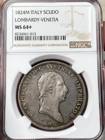 万国钱币拍卖第054期 - NGC MS64 1824伦巴第-威尼西亚王国Scudo大银 米兰造币厂铸，奥地利统治时期的产物，其纹章将象征哈布斯堡皇室的双头鹰与象征威尼斯的狮子和象征米兰的蛇结合起来，其正面则是奥地利皇帝弗朗茨一世。1866普奥战争之后，这个短暂的王国也随着奥地利的战败合并回意大利，原味五彩，罕见高品质，NGC唯一亚军分，更高分仅一枚。