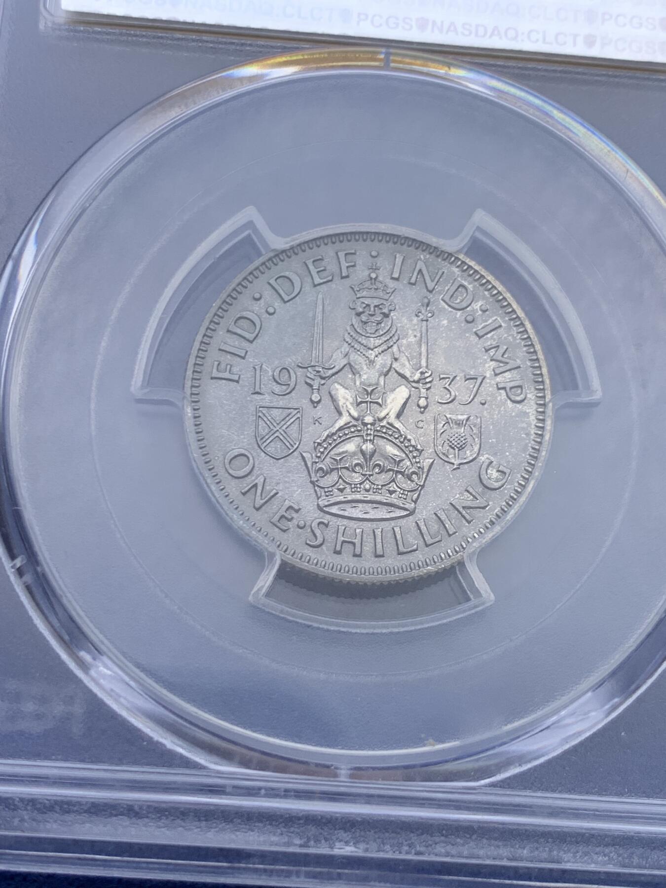 《竞宝斋》第434场 周日，周一2场连拍 （全场包邮） PCGS PR65英国1937年乔治六世精制镜面1先令英格兰坐狮，正反面黑白包浆非常好看，盒子支撑有点小磕