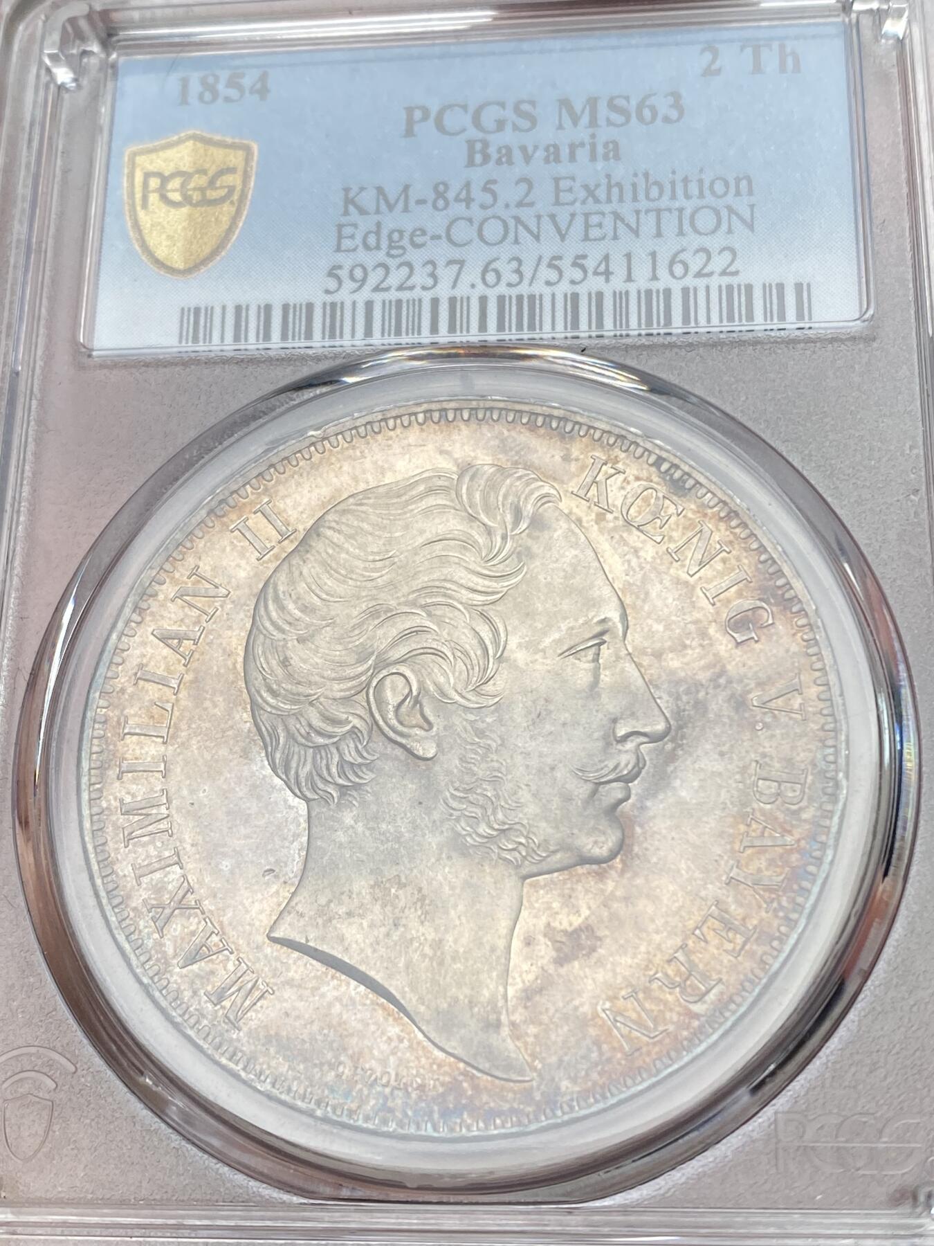 万国钱币拍卖第054期 PCGS MS63 1854年德国巴伐利亚马克西米利安二世双狮纹章2泰勒 PC错标为水晶宫 绚丽环彩包浆 流通2t中难得一见的品质 一步到位典藏级