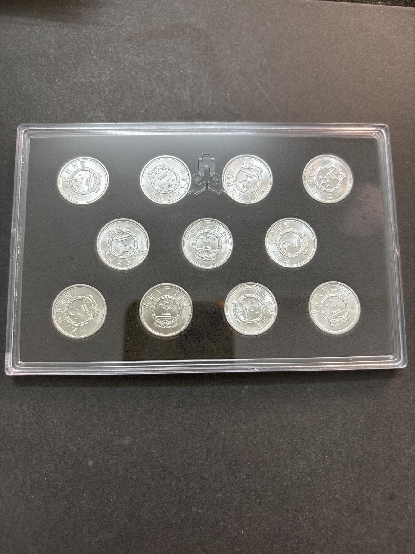 文馨钱币收藏第 278 场，银元，纸币，铜章场 长期接收代拍品 全新 2005-2017 年全新带册子未流通  1 分 10 枚一册