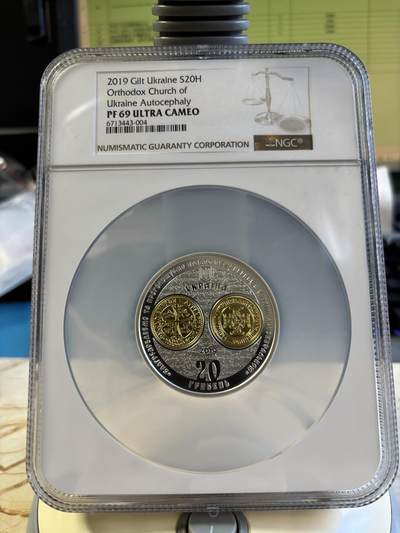第180期拍卖【长期征集拍品】【北京币展专场】 - 乌克兰2019年东正教会镀金2盎司纪念银币NGC-PF69无盒无证书，999银