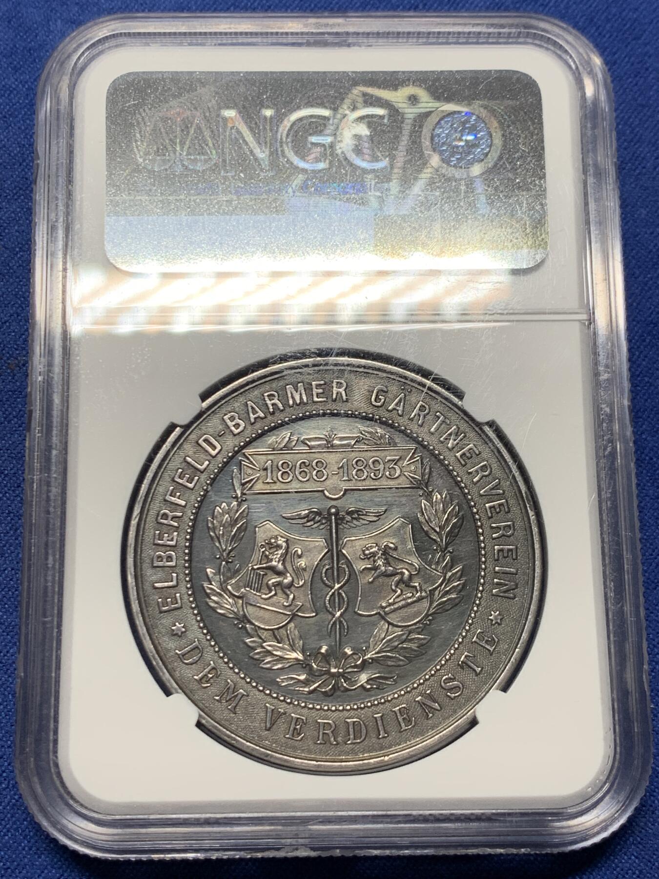 《竞宝斋》第434场 周日，周一2场连拍 （全场包邮） NGC MS61 德国1893年园艺博览会大银章，41mm大规格，少女衣纹流畅丰美，花卉蔬果刻画精细，工艺精湛。黑彩老包浆非常漂亮，实物状态极佳，严重低评