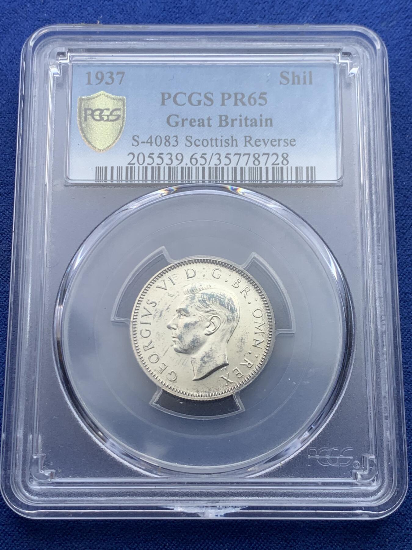 《竞宝斋》第434场 周日，周一2场连拍 （全场包邮） PCGS PR65英国1937年乔治六世精制镜面1先令英格兰坐狮，正反面黑白包浆非常好看，盒子支撑有点小磕