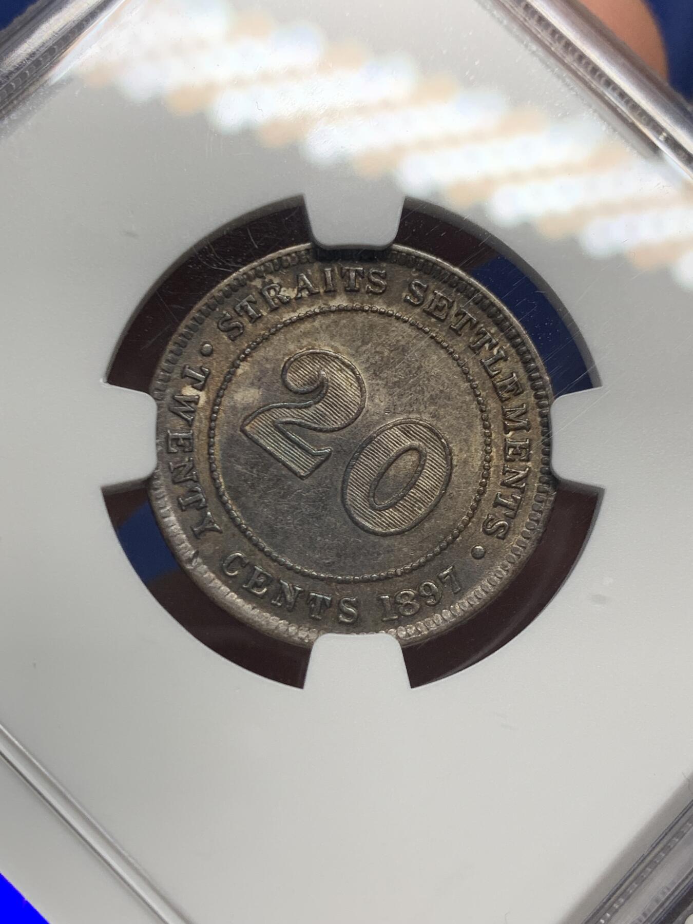 《竞宝斋》第434场 周日，周一2场连拍 （全场包邮） NGC AU58 英属海峡1897H维多利亚女王20分银币，双面顶级重五彩，发丝皇冠全深打，状态绝赞。铸量仅18万5千，后期高难年份，60分书价600美元，季军分，更高仅6枚。早在14年外拍同分就以250美元成交，包浆远不如此枚