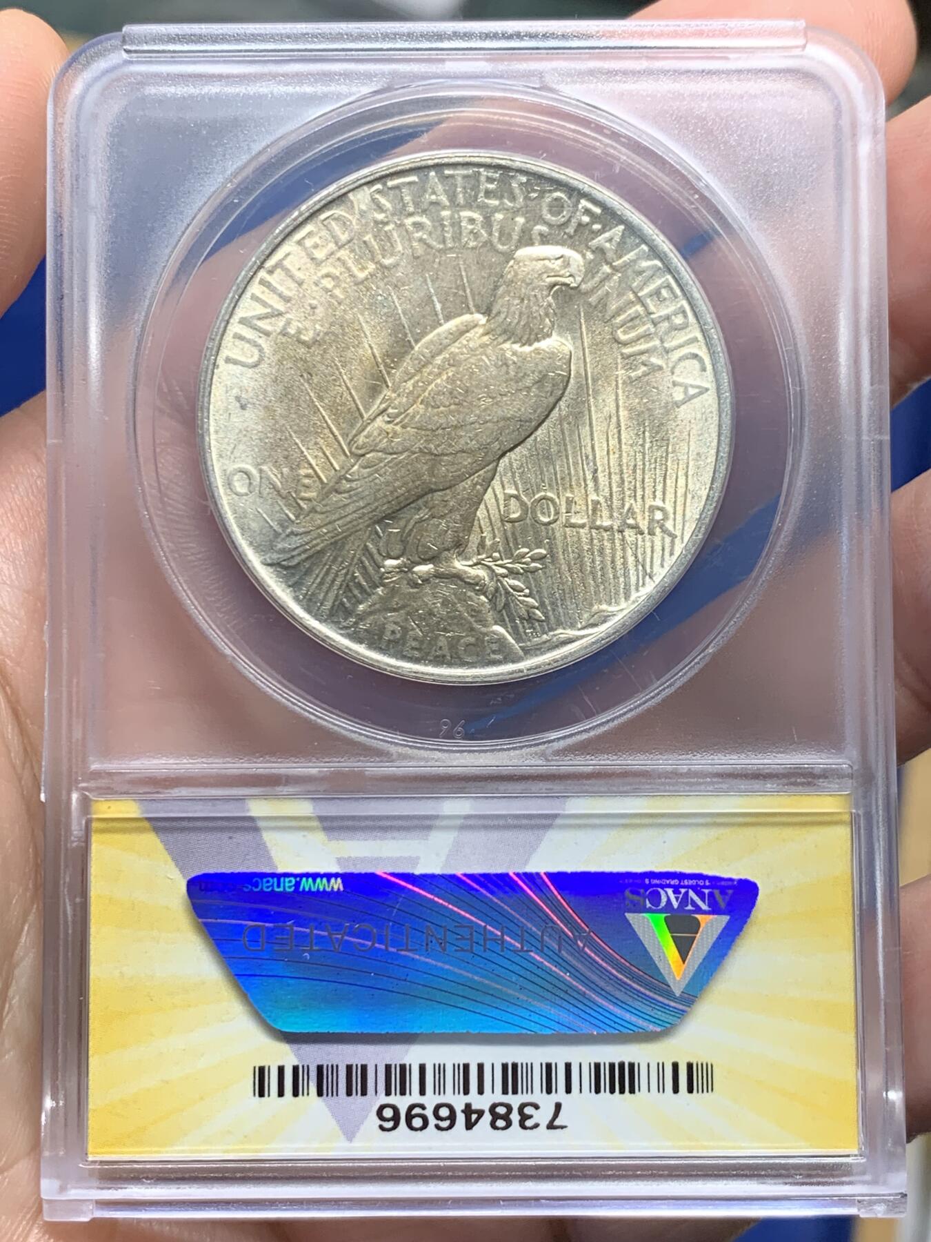 《竞宝斋》第435场 周日，周一2场连拍 （全场包邮） ANACS AU58 小黄盒 1922年美国和平银币，两面带着黄油光，实物不错。