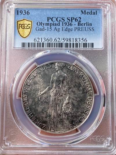 万国钱币拍卖第054期 - PCGS SP62 1936年德国民族社会主义工人党奥林匹克运动会纪念银章 特殊时期的奥运章原味酱彩诱人（原图请私信后台或自行查询官网）