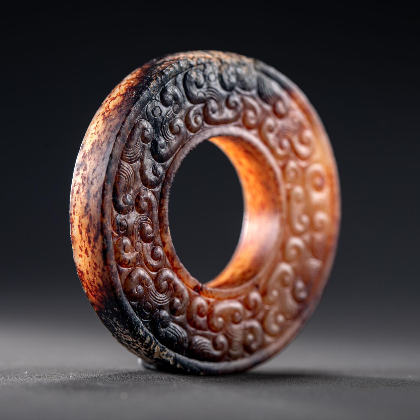 日本大阪雅和auction 2025金秋競賣會第一期 戰國 連雲紋玉璧 尺寸:D:4.5cm