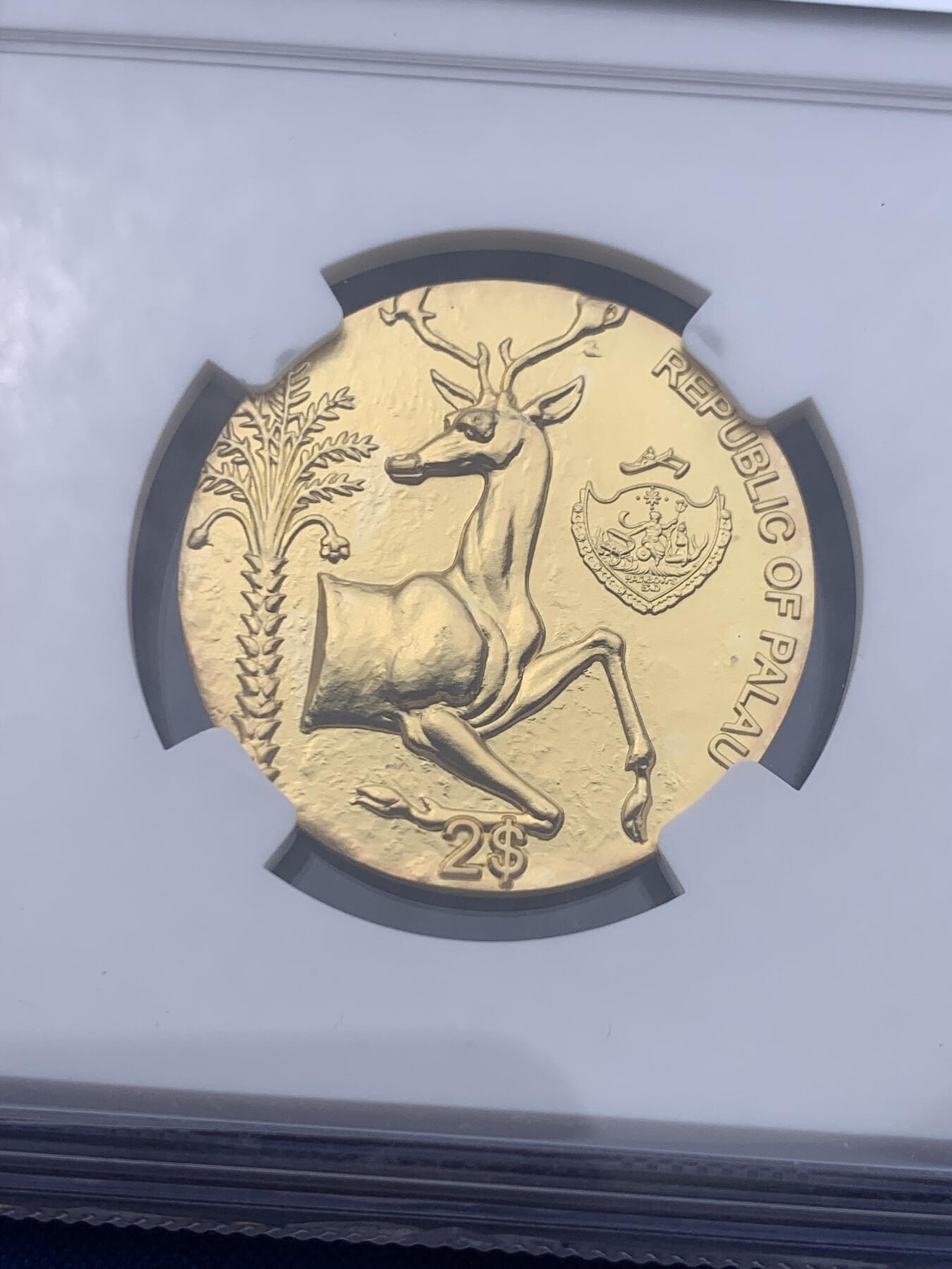 《竞宝斋》第435场 周日，周一2场连拍 （全场包邮） NGC MS70 帕劳蜜蜂-雄鹿镀金银币，寓意一路甜甜蜜蜜，复刻珍稀古币，采用智能造币技术，超高浮雕，实物精美，视觉冲击强，NGC首期蓝标，满分，带原盒原证书。