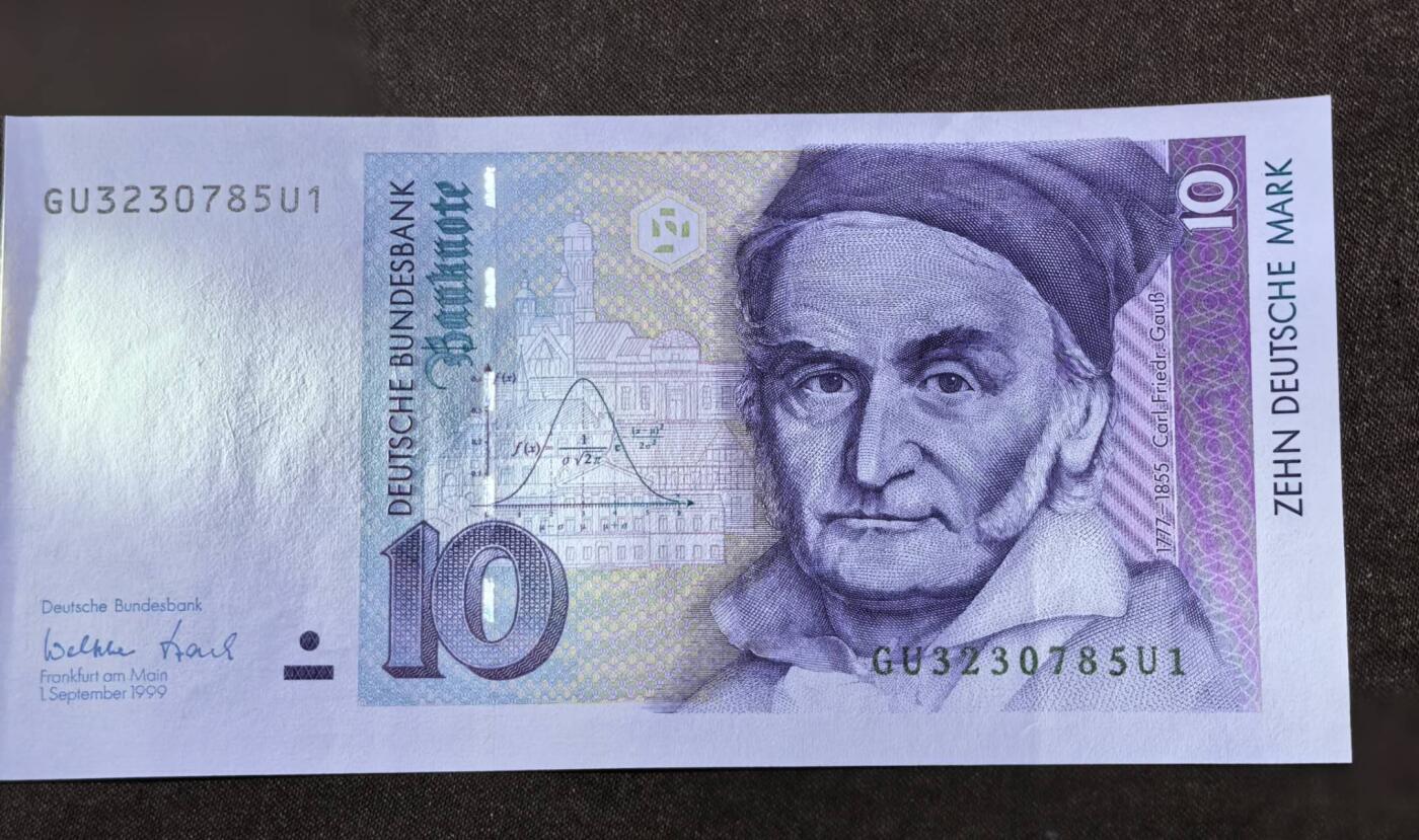 北京马甸外国币专卖第146期，外国纸币币专场，陆续上拍，欢迎关注 1999年德国10马克全新强光下隐约有一竖软折如图