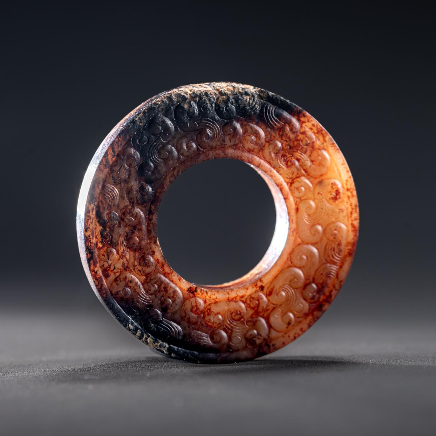 日本大阪雅和auction 2025金秋競賣會第一期 戰國 連雲紋玉璧 尺寸:D:4.5cm