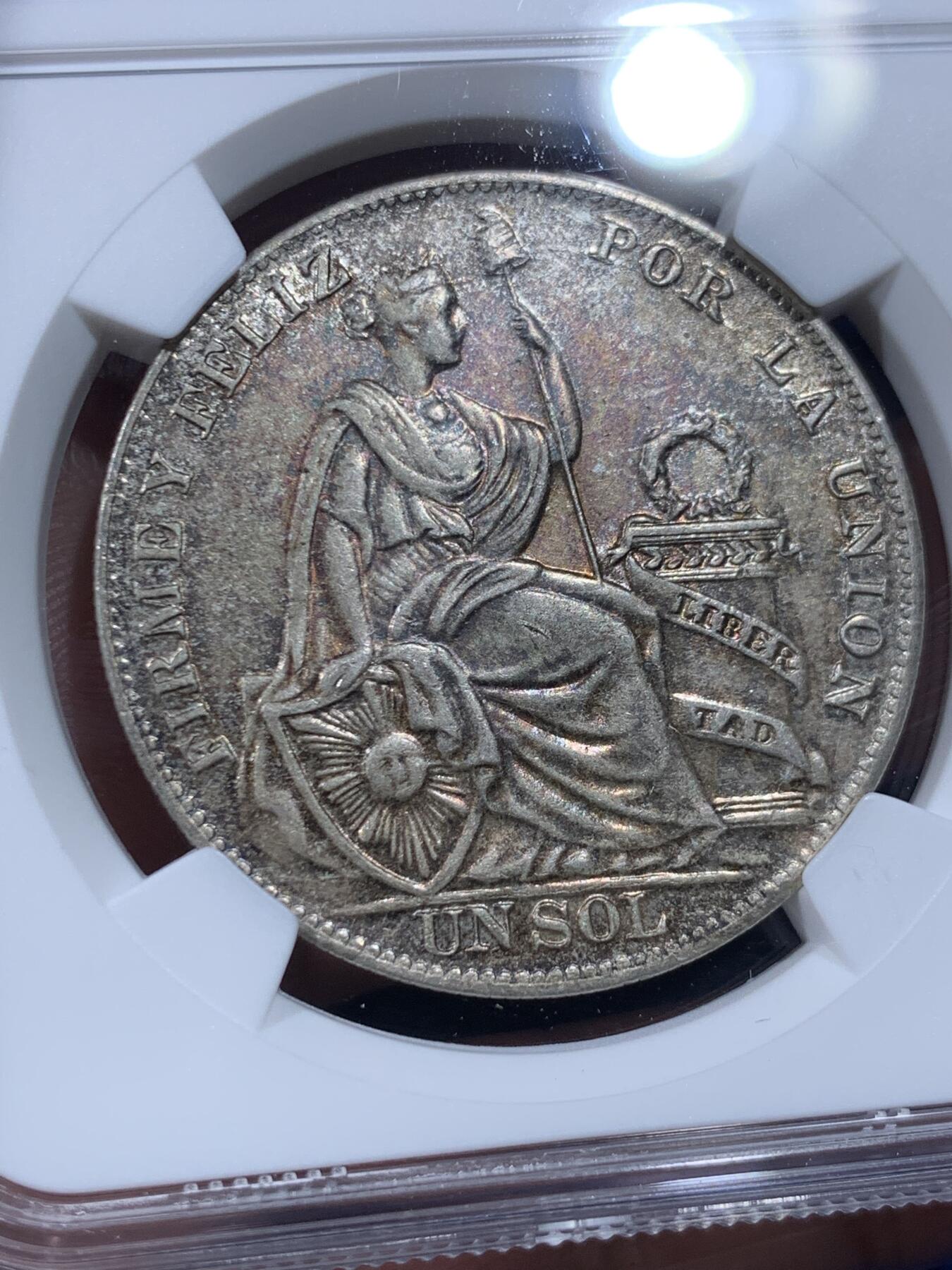 《竞宝斋》第435场 周日，周一2场连拍 （全场包邮） NGC AU55 秘鲁1934年一索尔坐人银币，淡彩美品，好状态。