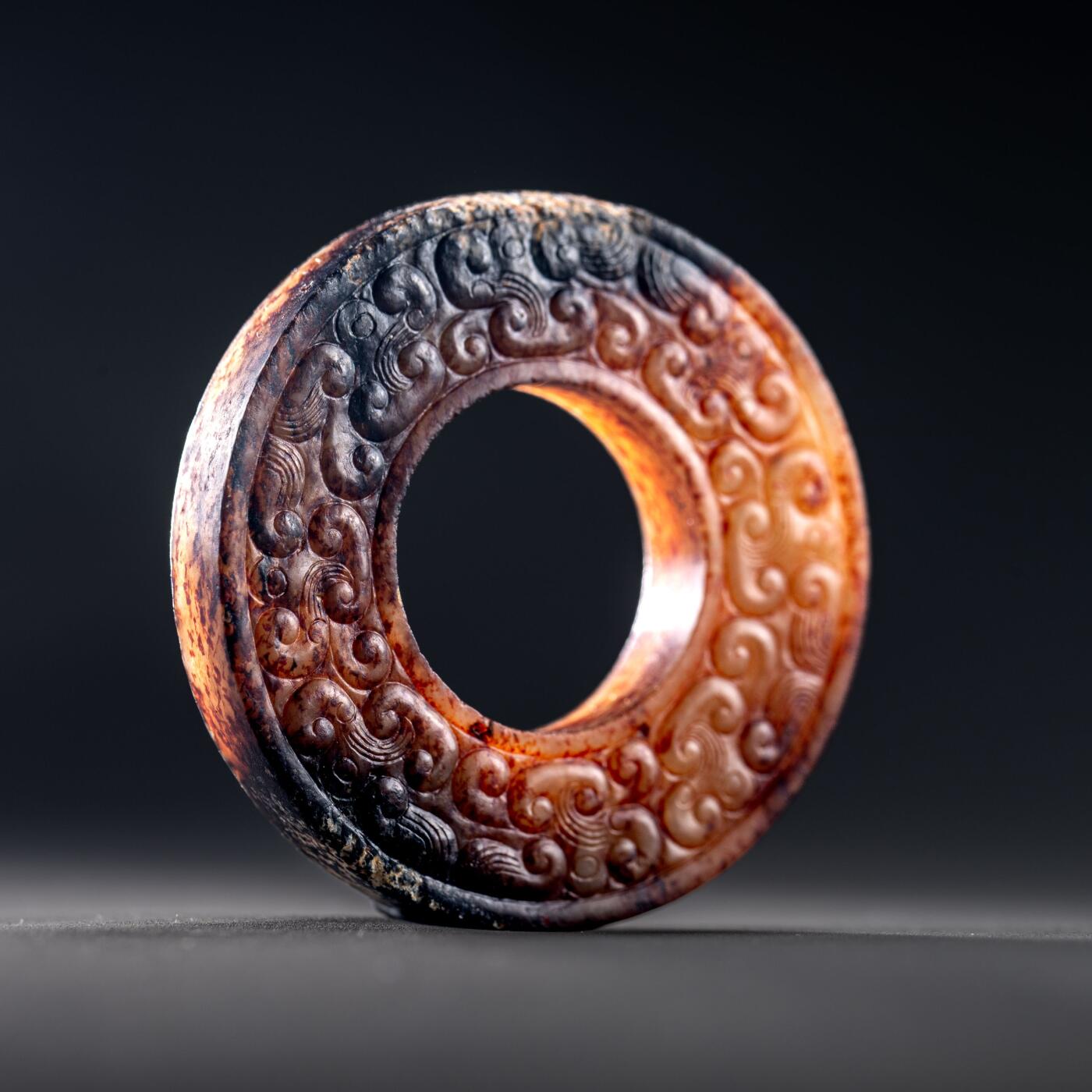 日本大阪雅和auction 2025金秋競賣會第一期 戰國 連雲紋玉璧 尺寸:D:4.5cm