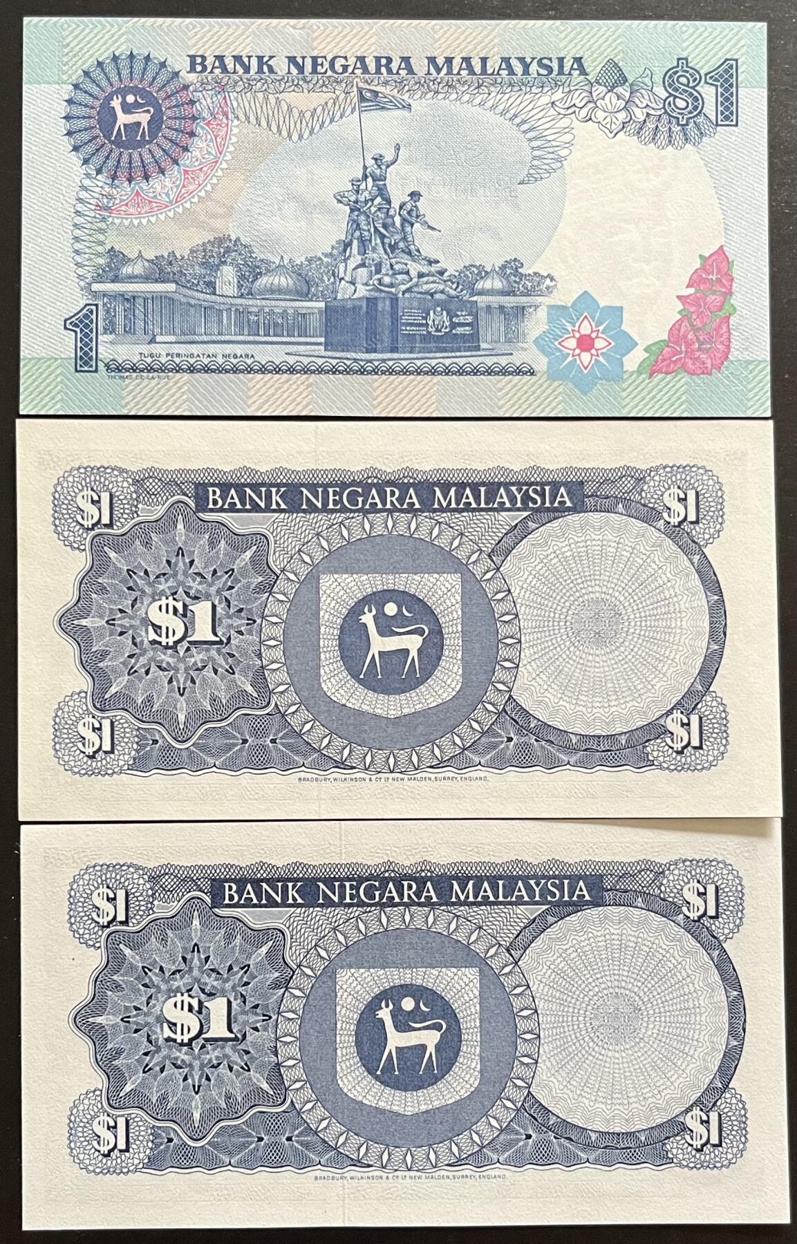 小福收藏拍卖第197期 裸钞场 本期有多张豹子号靓号 百慕大03年50元纪念钞百位号 马来亚和英属婆罗洲开国第一张纸币大冠女王 马来亚 41年1元英王乔六 法属太平洋10000法郎 捷克1000克朗纪念钞千位号  卢森堡 1000法郎  萨尔瓦多样钞 匈牙利 法罗群岛 危地马拉等多国精美纸币 马来西亚1976年1林吉特+1981年1林吉特 +1989年1林吉特 分段安全线 数3 1组3张 unc