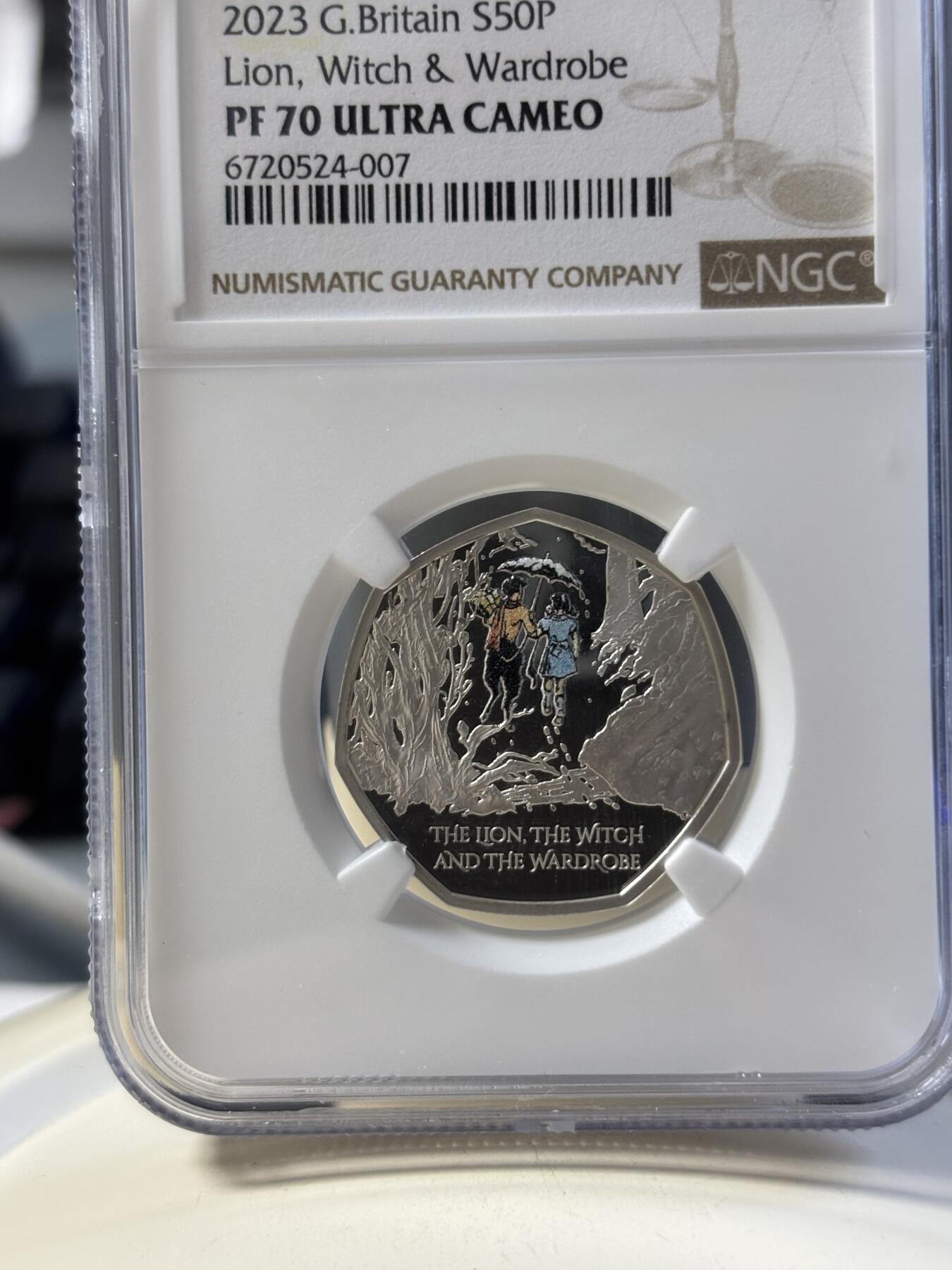 第181期拍卖 英国2023年狮子，女巫和魔衣棚50便士彩色纪念银币NGC-PF70无原盒证书，925银，8克，发行5000枚