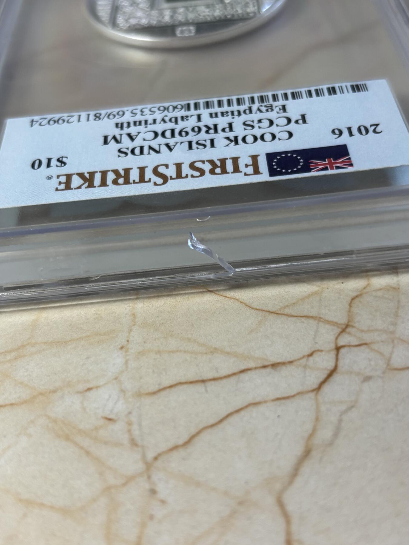 第181期拍卖 库克2016年人类里程碑镶微型迷宫纪念银币PCGS-PR69，999银，50克，发行量999枚，评级盒有裂痕