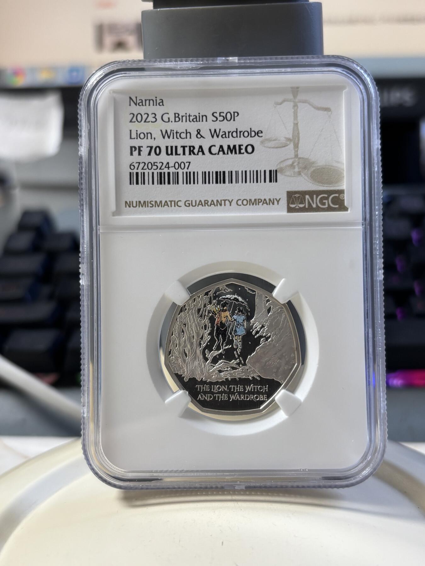 第181期拍卖 英国2023年狮子，女巫和魔衣棚50便士彩色纪念银币NGC-PF70无原盒证书，925银，8克，发行5000枚