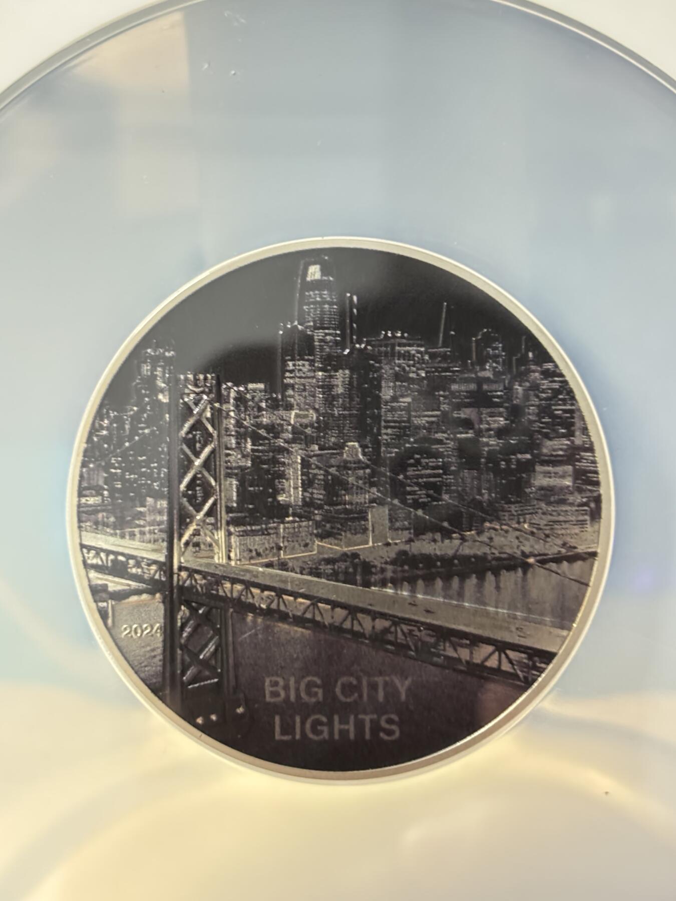 第181期拍卖  库克2024年发行的城之光系列-旧金山光线反射纪念银币NGC-PF70首 无盒无证书，999银，1盎司