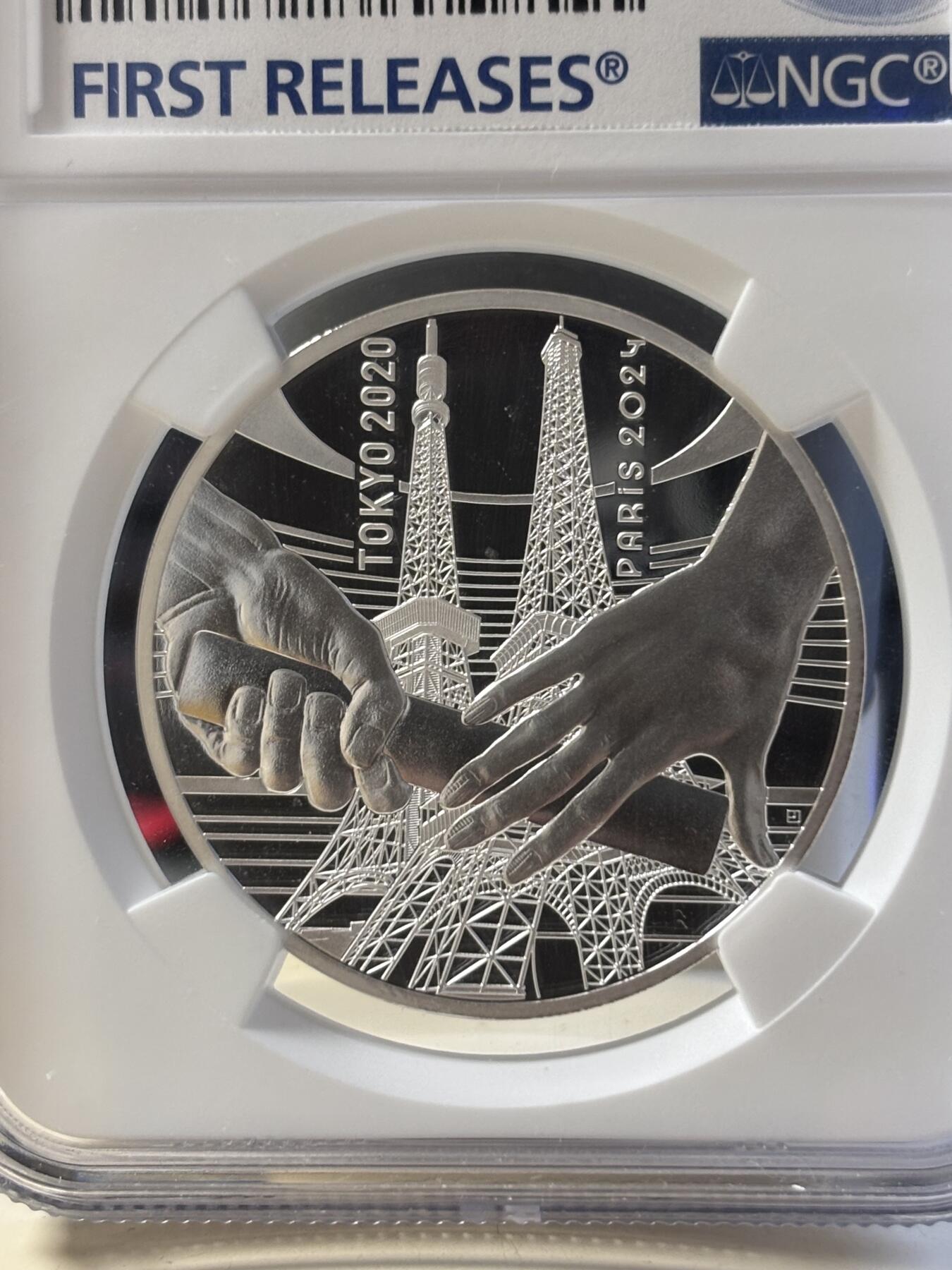 第181期拍卖 法国2021年东京到巴黎奥运交接纪念银币NGC-PF70首无盒无证书，999银，22.2克，发行30000枚，有氧化点