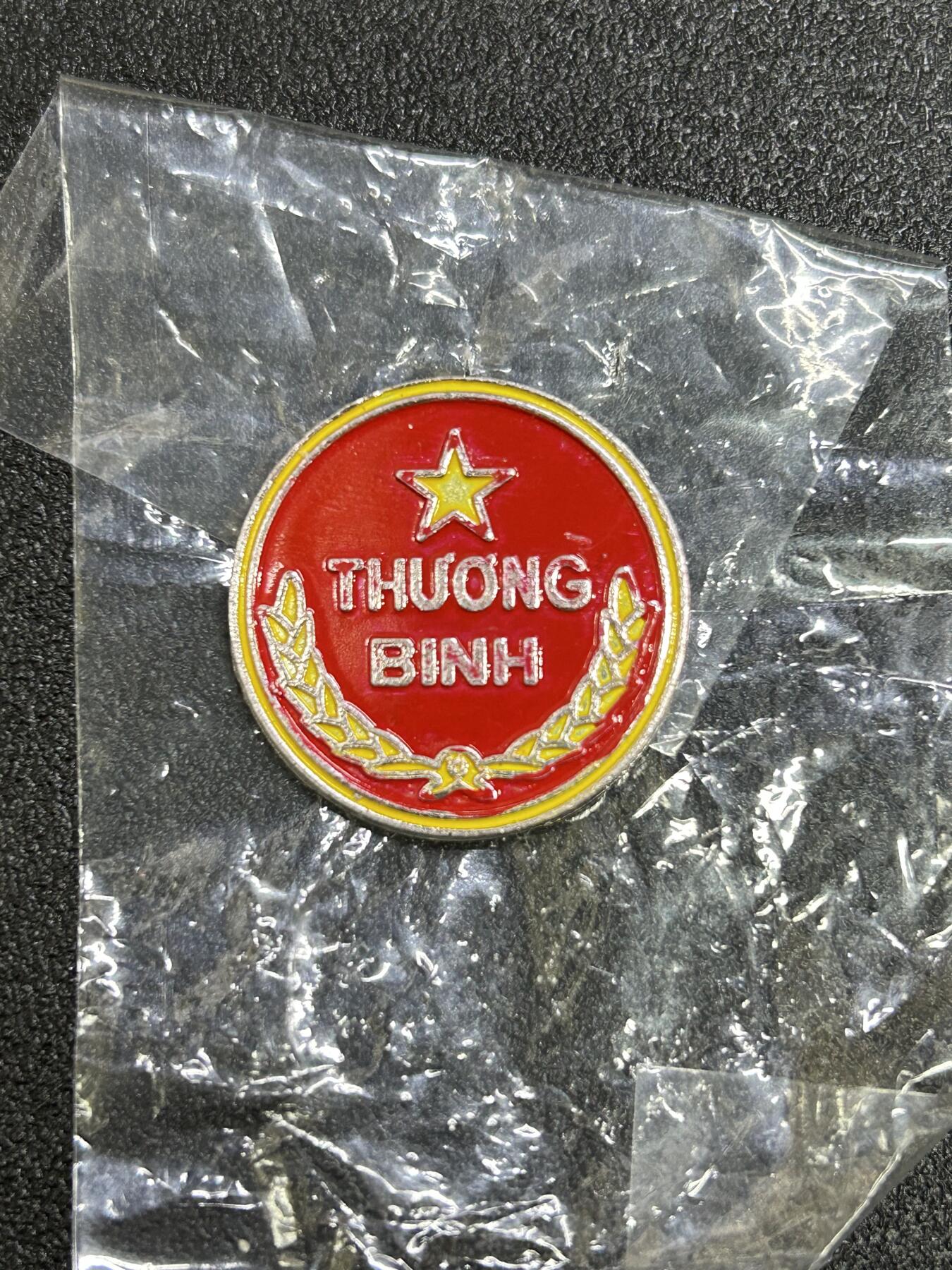 西秦中古拍卖第六十四期 越南战伤军人证章 早期版