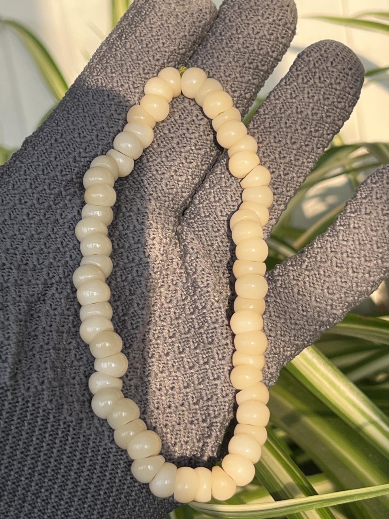 零元拍：NO.4 精工 奶油超润驼骨蒜瓣儿手串手持8左右