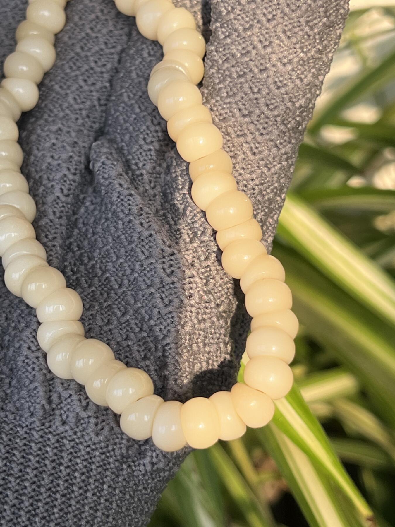 零元拍：NO.4 精工 奶油超润驼骨蒜瓣儿手串手持8左右