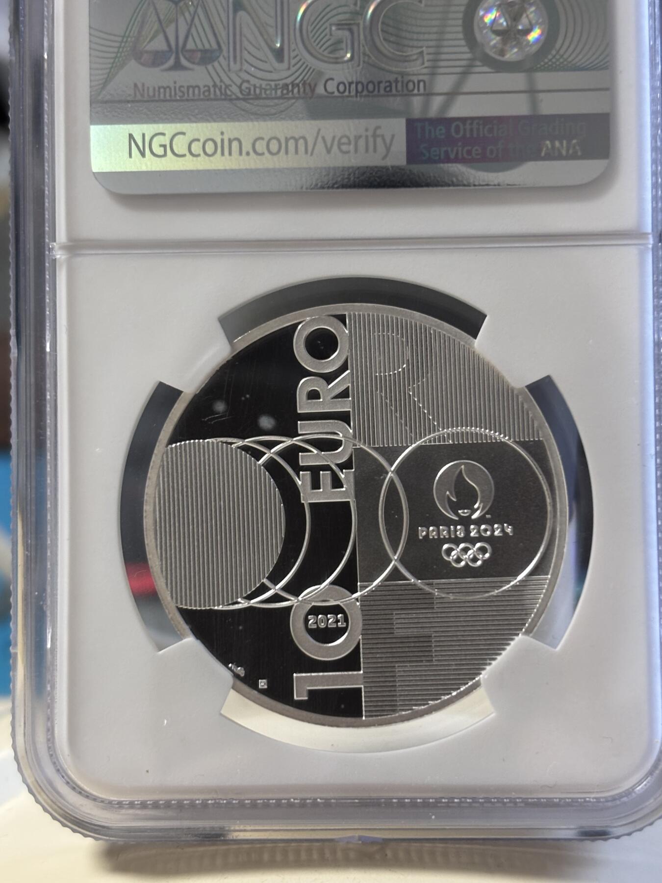 第181期拍卖 法国2021年东京到巴黎奥运交接纪念银币NGC-PF70首无盒无证书，999银，22.2克，发行30000枚，有氧化点