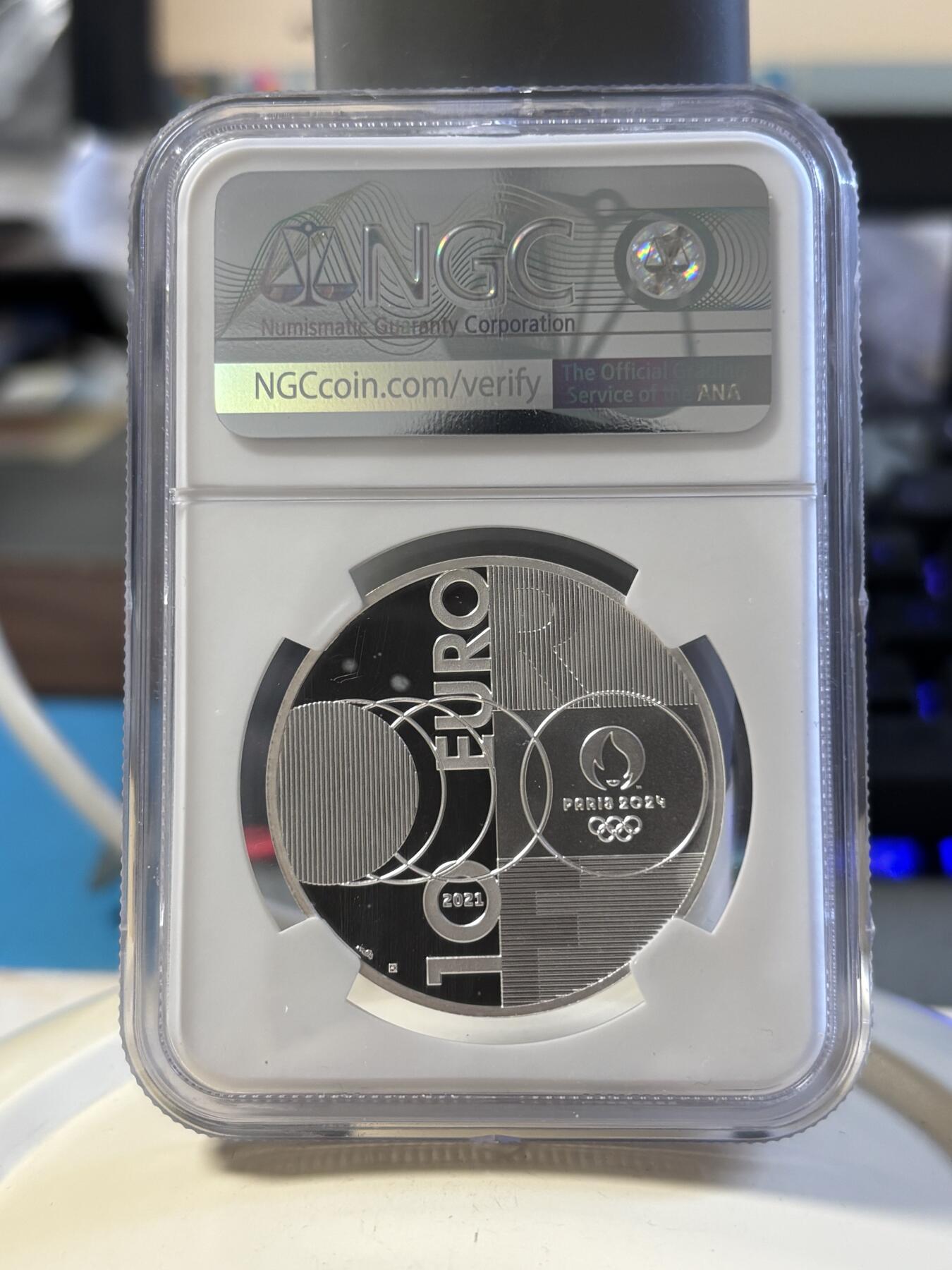第181期拍卖 法国2021年东京到巴黎奥运交接纪念银币NGC-PF70首无盒无证书，999银，22.2克，发行30000枚，有氧化点