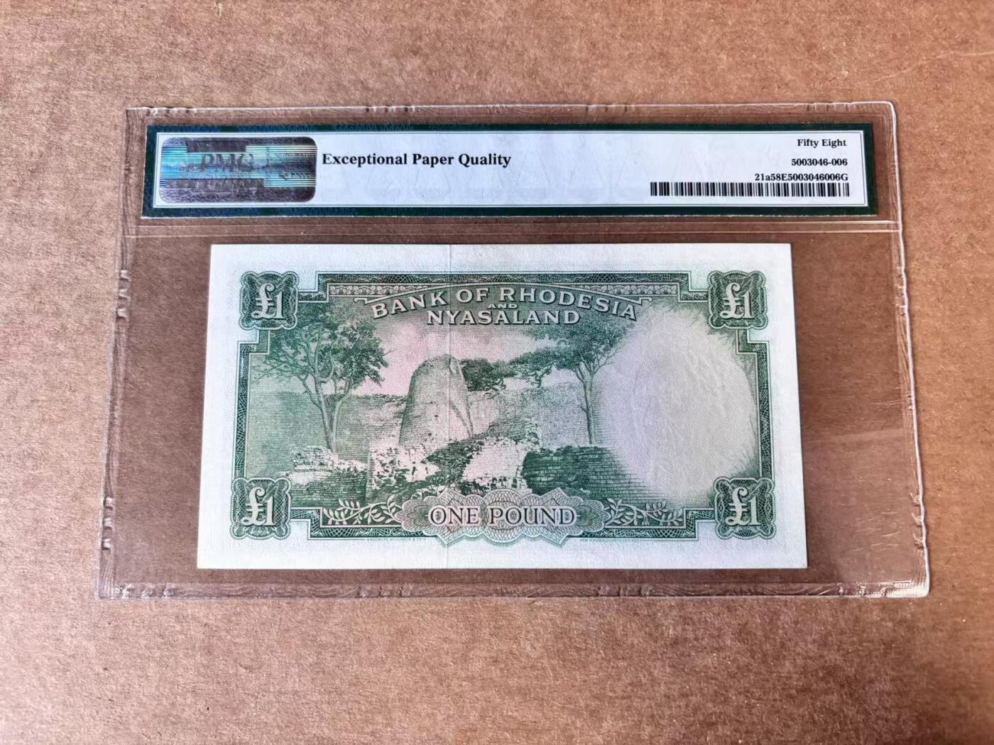 【Blue Auction】世界纸币精拍第746期——18级TOP拍卖/信誉/品质/专业/高效💫 罗德西亚和尼亚萨兰 1960年1镑 大冠女王 BWC出品雕刻精美 大津巴布韦遗址 豹子 PMG58EPQ 近新原票  