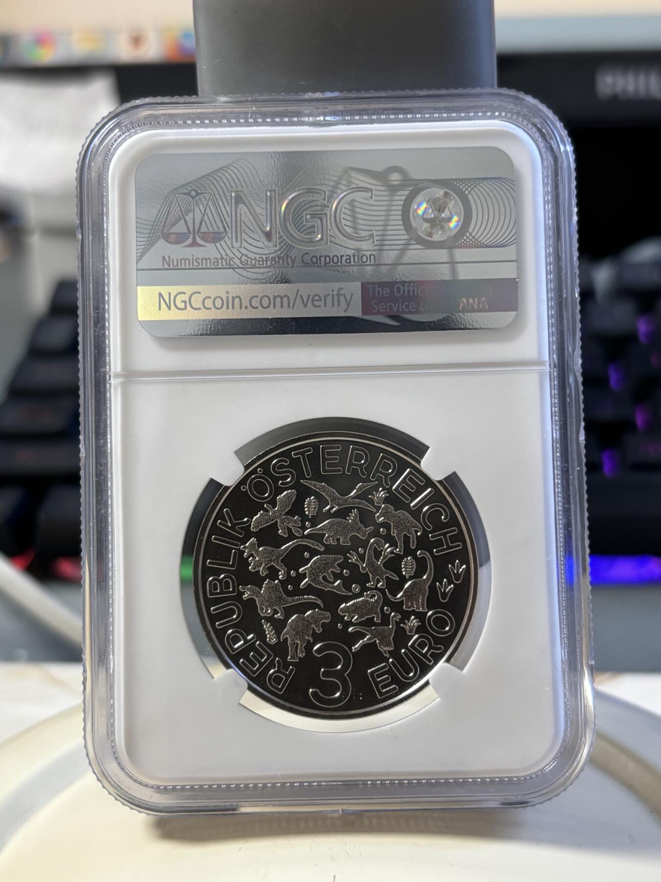 第181期拍卖 奥地利2021年夜光恐龙系列亚伯达戟龙纪念币NGC-MS70首无盒无证书