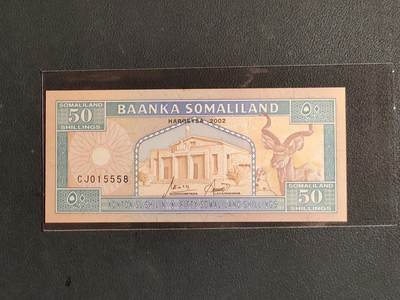 中外各国钞、纪念钞、券专场（第三十二场） - 2002年50先令纸币  索马里兰动物 非洲外国钱币全新有斑（好号）