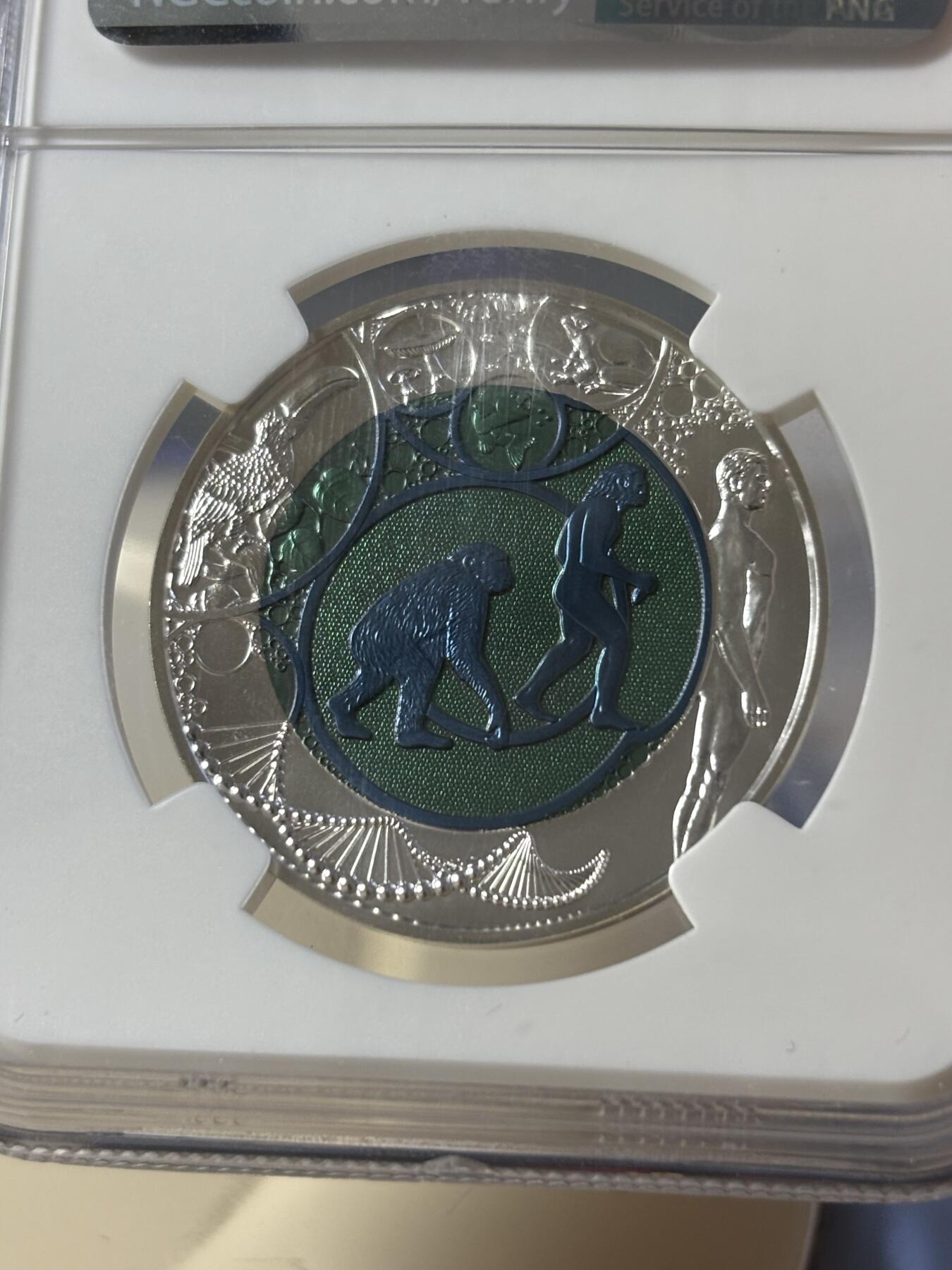 第181期拍卖 奥地利2014进化论铌银镶双色纪念币NGC-MS70无盒无证书，金属:900银998铌，重量:10克和7.15克，发行：65000枚