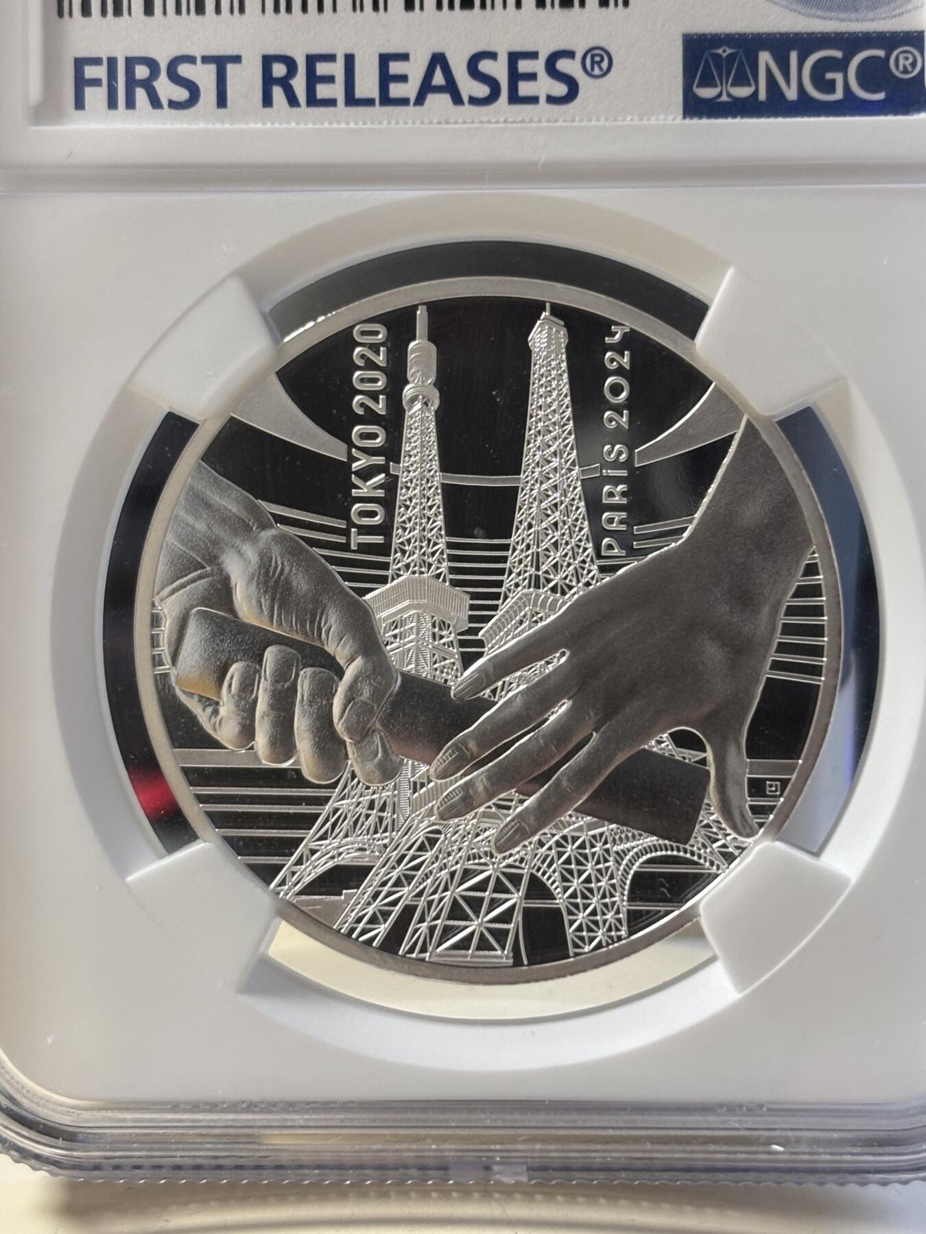 第181期拍卖 法国2021年东京到巴黎奥运交接纪念银币NGC-PF70首无盒无证书，999银，22.2克，发行30000枚，有氧化点