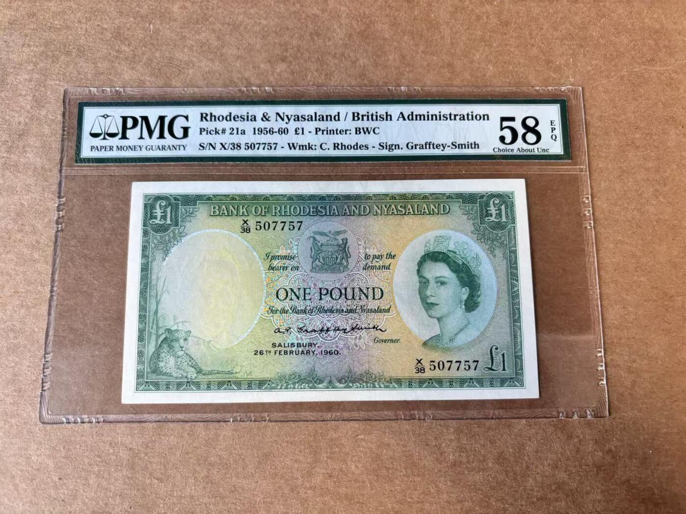 【Blue Auction】世界纸币精拍第746期——18级TOP拍卖/信誉/品质/专业/高效💫 罗德西亚和尼亚萨兰 1960年1镑 大冠女王 BWC出品雕刻精美 大津巴布韦遗址 豹子 PMG58EPQ 近新原票  