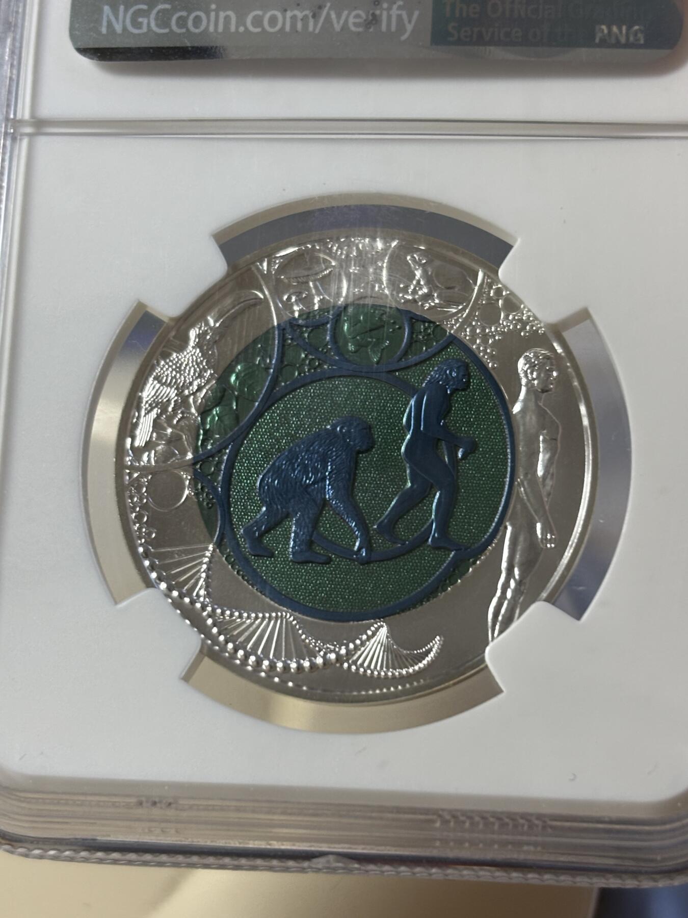 第181期拍卖 奥地利2014进化论铌银镶双色纪念币NGC-MS70无盒无证书，金属:900银998铌，重量:10克和7.15克，发行：65000枚