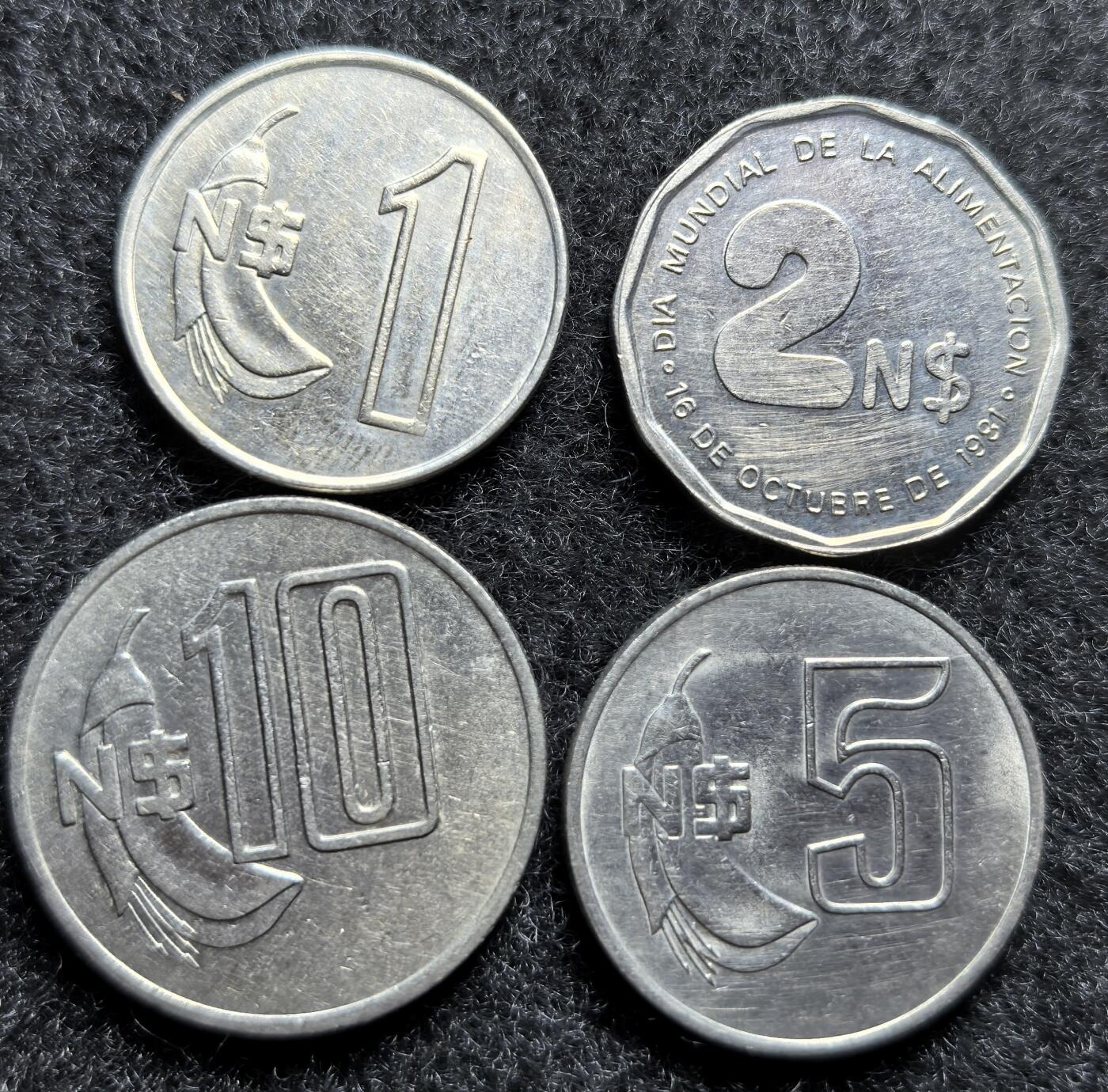 西班牙、丹属西印度、法属殖民地、乌拉圭银币古铜币，周五晚上九点倒数截拍，满百包邮，可寄存半年，喜欢朋友微信扫描二维码可直接参拍 乌拉圭镍高面值币4枚1980年-1981年