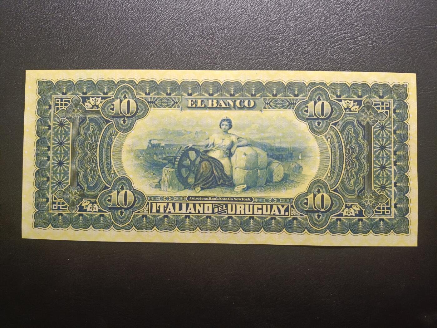 2025十一月第二期，总第200期 乌拉圭意大利银行1887年10比索UNC有针孔无47，极稀有的乌拉圭外资银行品种，正面是时任乌拉圭总统的奥多涅斯将军和发现新大陆的哥伦布，而背面是女性肖像坐在象征工业的铁砧飞轮和棉纱包中，背景是飞驰的火车