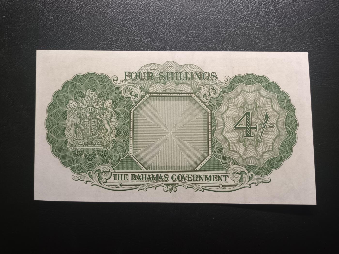 2025十一月第二期，总第200期 英属巴哈马1953版4先令AUNC，大皇冠女王和总督府徽章