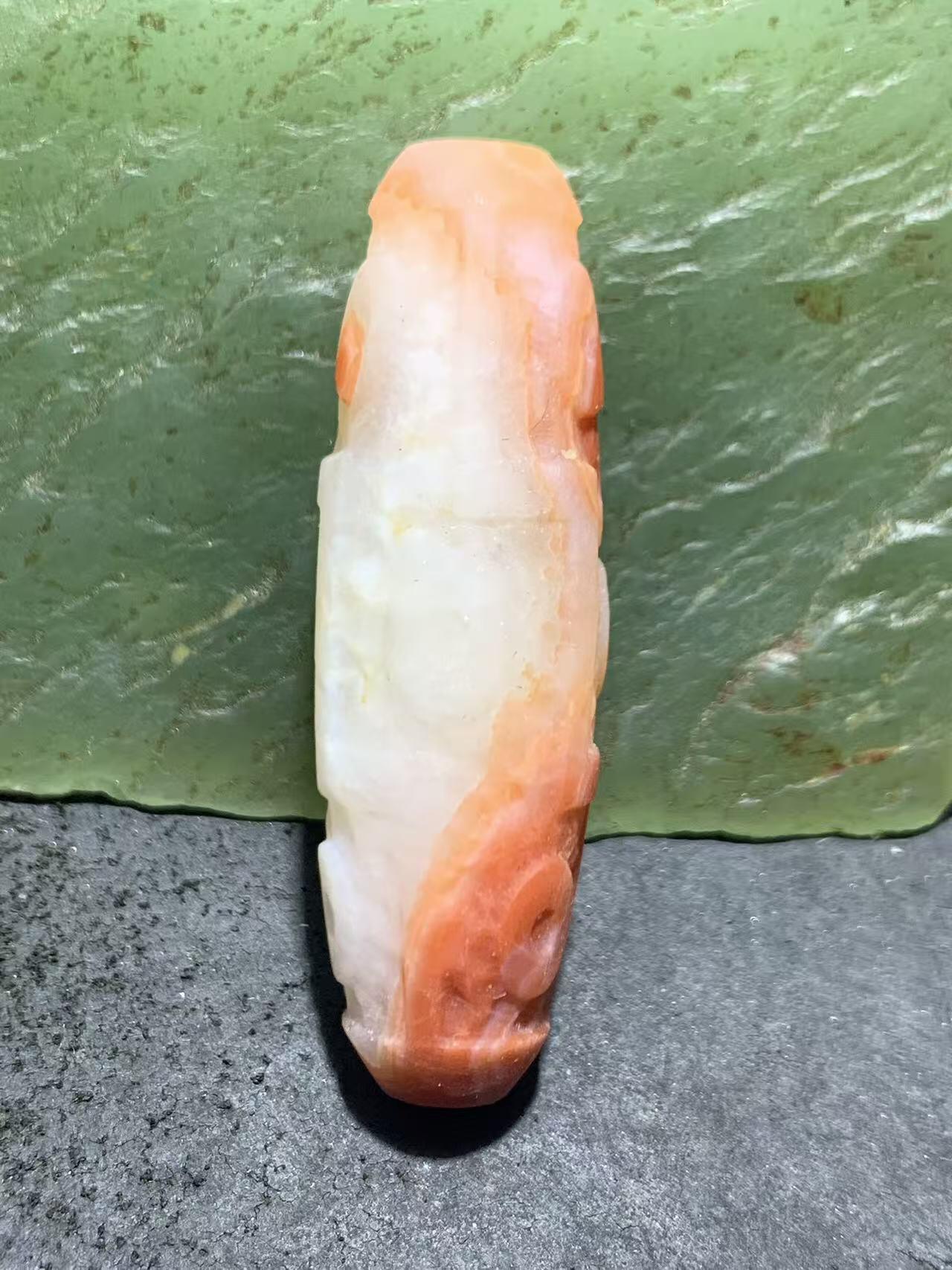 精美川料亚光红白南红玛瑙雕刻九眼天珠一个，