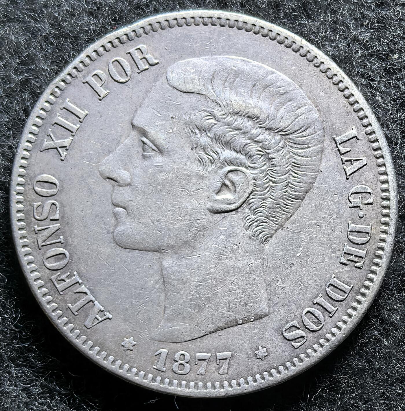 西班牙、丹属西印度、法属殖民地、乌拉圭银币古铜币，周五晚上九点倒数截拍，满百包邮，可寄存半年，喜欢朋友微信扫描二维码可直接参拍 好品相西班牙1877年5比塞塔大银币，km676