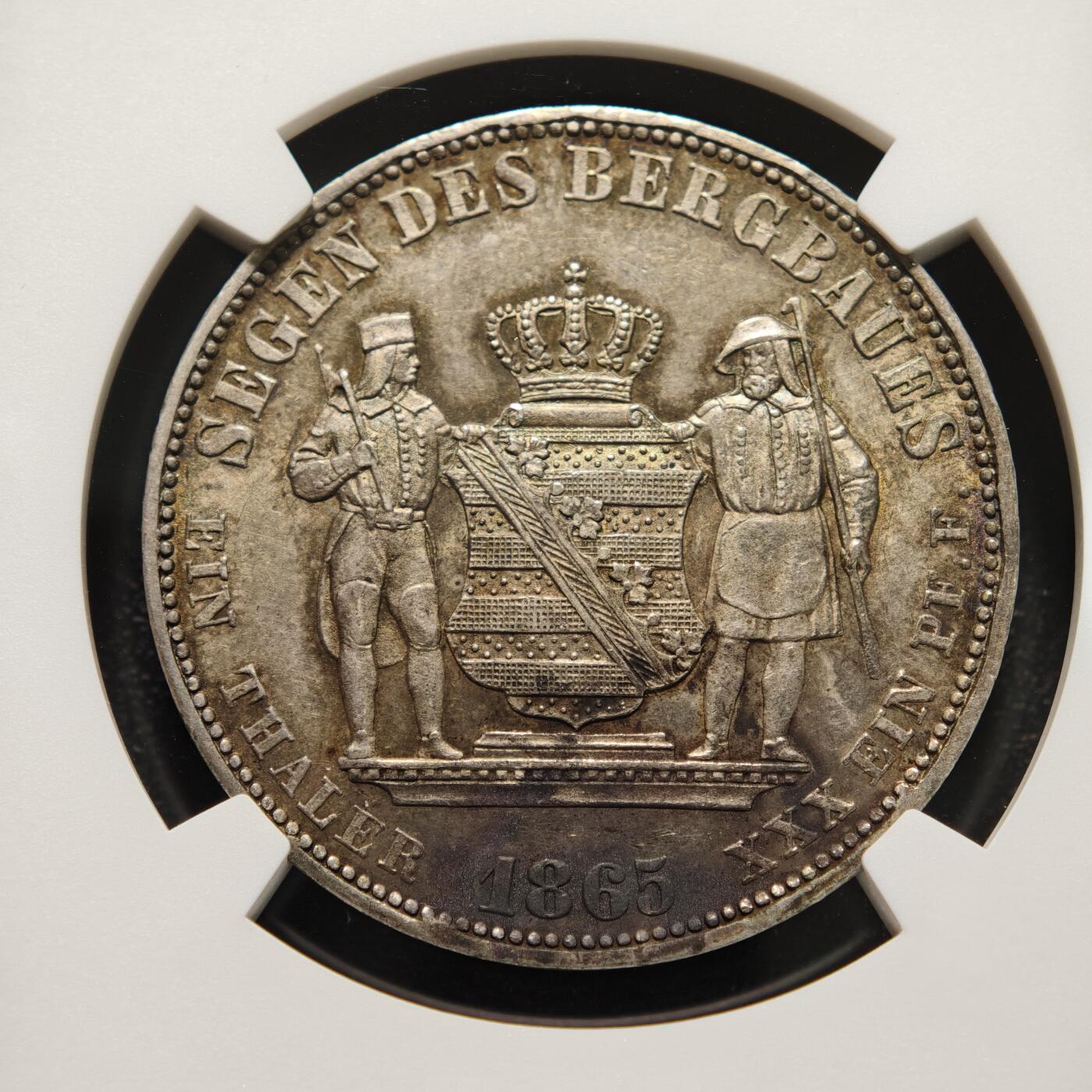 【德藏】世界币章拍卖第152期（拍品征集中~欢迎藏友联系） 1865年 德国萨克森王国矿业1泰勒银币  酱彩环状包浆状态好 正面是国王头像背面是两个矿工守护王国盾徽 NGC UNC