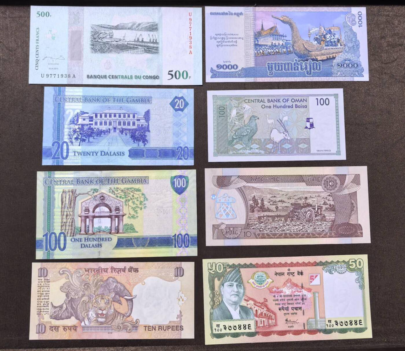 北京马甸外国币专卖第146期，外国纸币币专场，陆续上拍，欢迎关注 刚果首发冠纪念钞，冈比亚2张，柬埔寨纪念钞，阿曼，印度，尼泊尔，埃塞俄比亚8张纸币全新