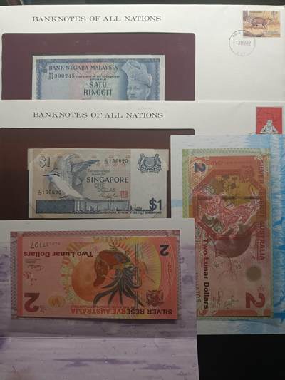 2025十一月第二期，总第200期 - 【雨】邮币封/商业钞册装批量四册UNC