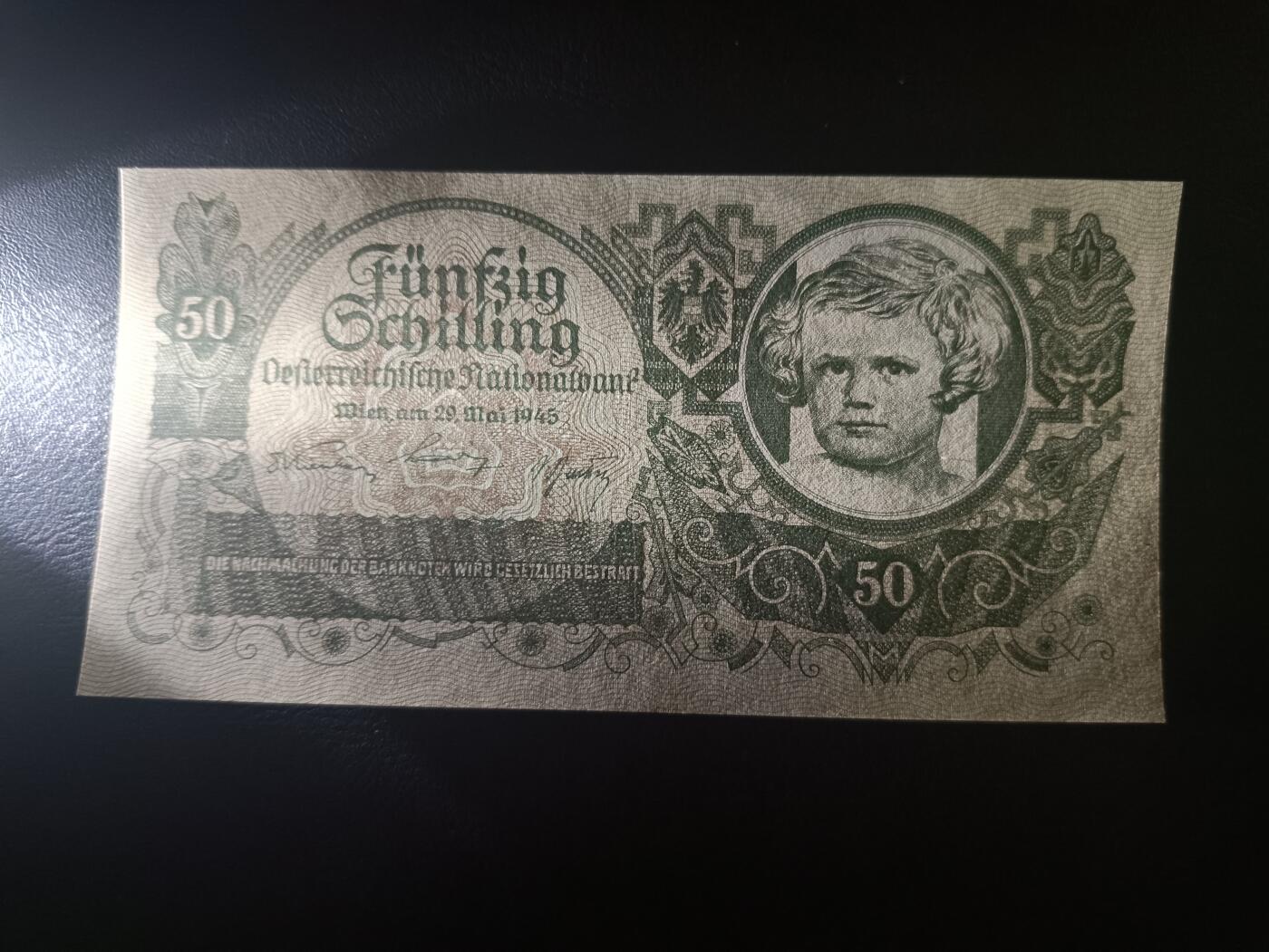 2025十一月第二期，总第200期 奥地利1945版50先令AUNC，二战结束后盟军托管期发行，理论上属于二战盟军军票的一部分