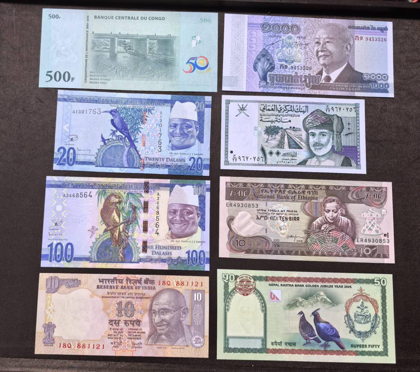 北京马甸外国币专卖第146期，外国纸币币专场，陆续上拍，欢迎关注 刚果首发冠纪念钞，冈比亚2张，柬埔寨纪念钞，阿曼，印度，尼泊尔，埃塞俄比亚8张纸币全新