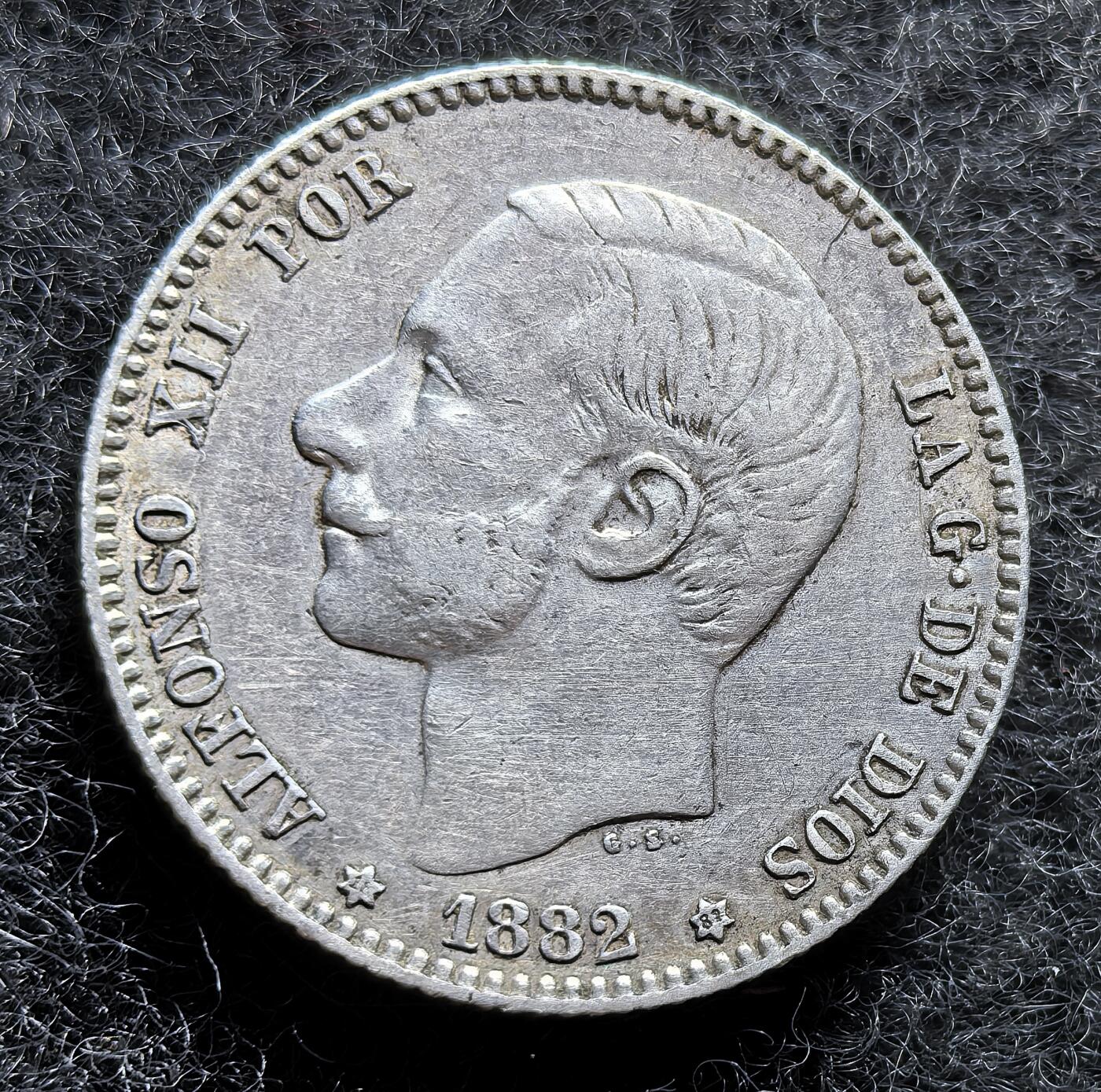 西班牙、丹属西印度、法属殖民地、乌拉圭银币古铜币，周五晚上九点倒数截拍，满百包邮，可寄存半年，喜欢朋友微信扫描二维码可直接参拍 AU品相西班牙1882年1比塞塔银币，km686