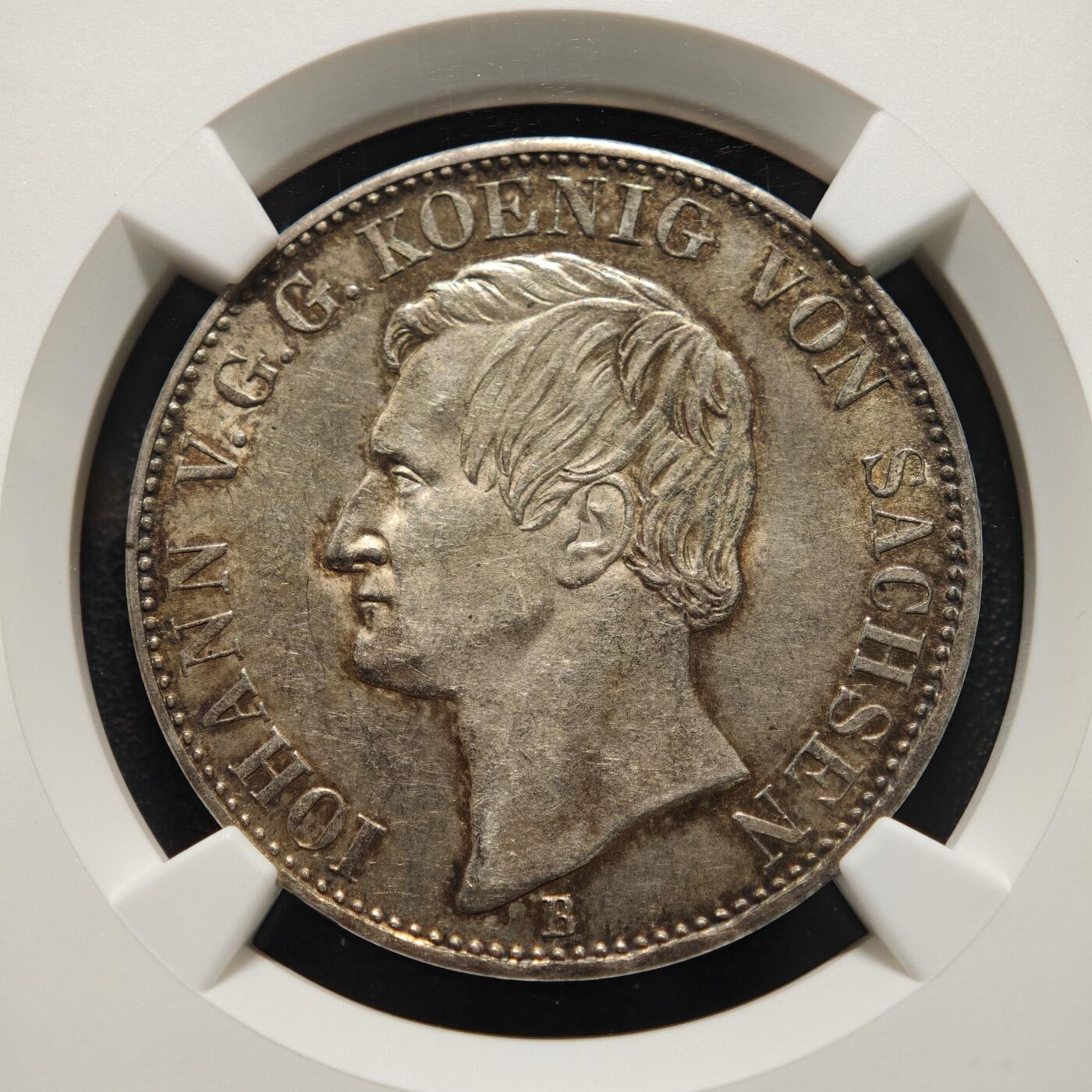 【德藏】世界币章拍卖第152期（拍品征集中~欢迎藏友联系） 1865年 德国萨克森王国矿业1泰勒银币  酱彩环状包浆状态好 正面是国王头像背面是两个矿工守护王国盾徽 NGC UNC